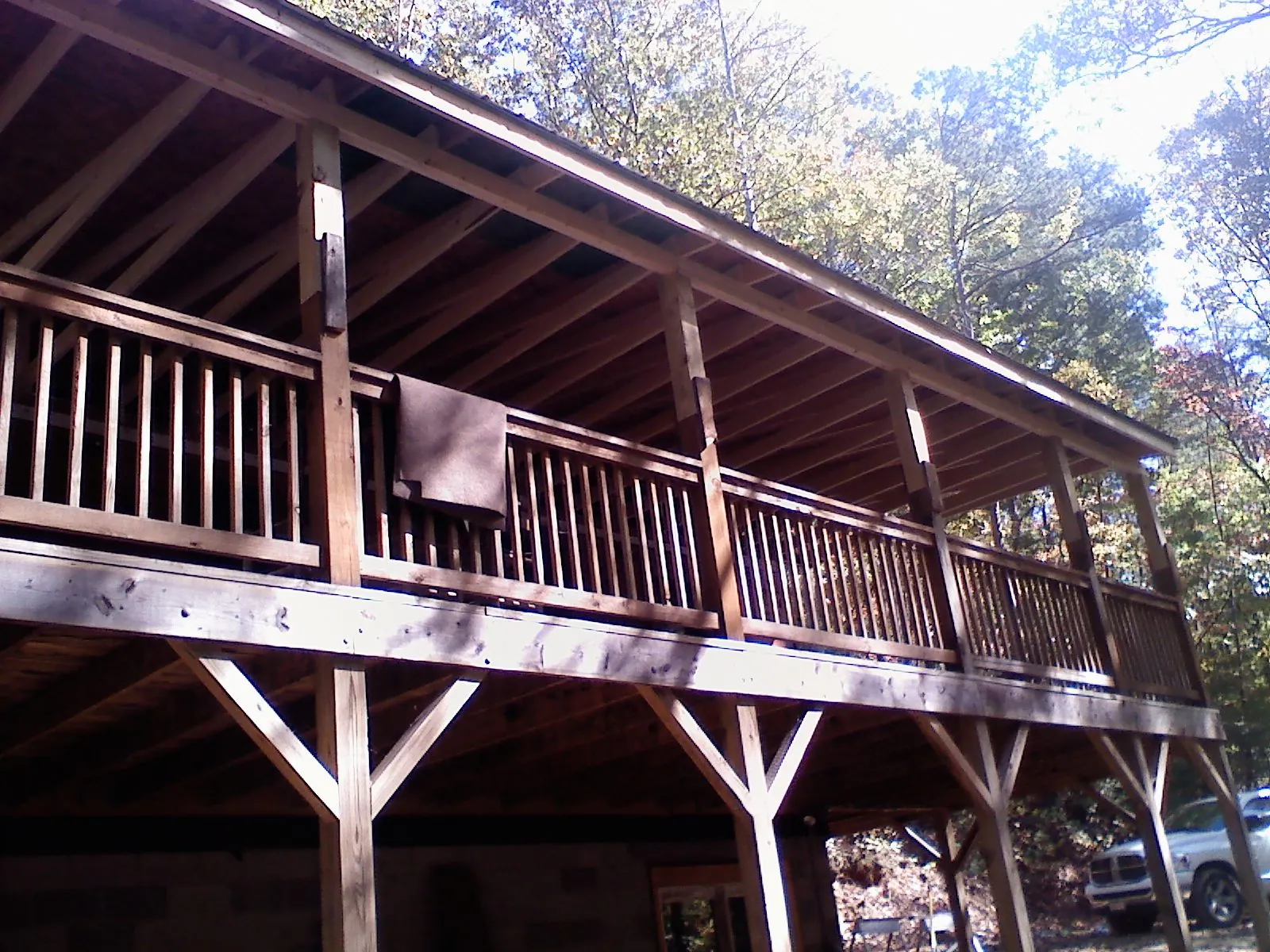 Timber framing under a new elevated porch and deck — Roof Leak Repair in Parshall by Roofing Brothers